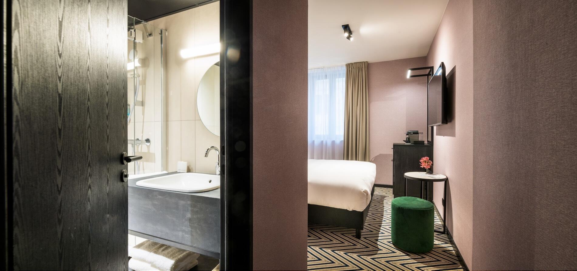 Bathroom and bedroom at Hotel Hubert Brussels